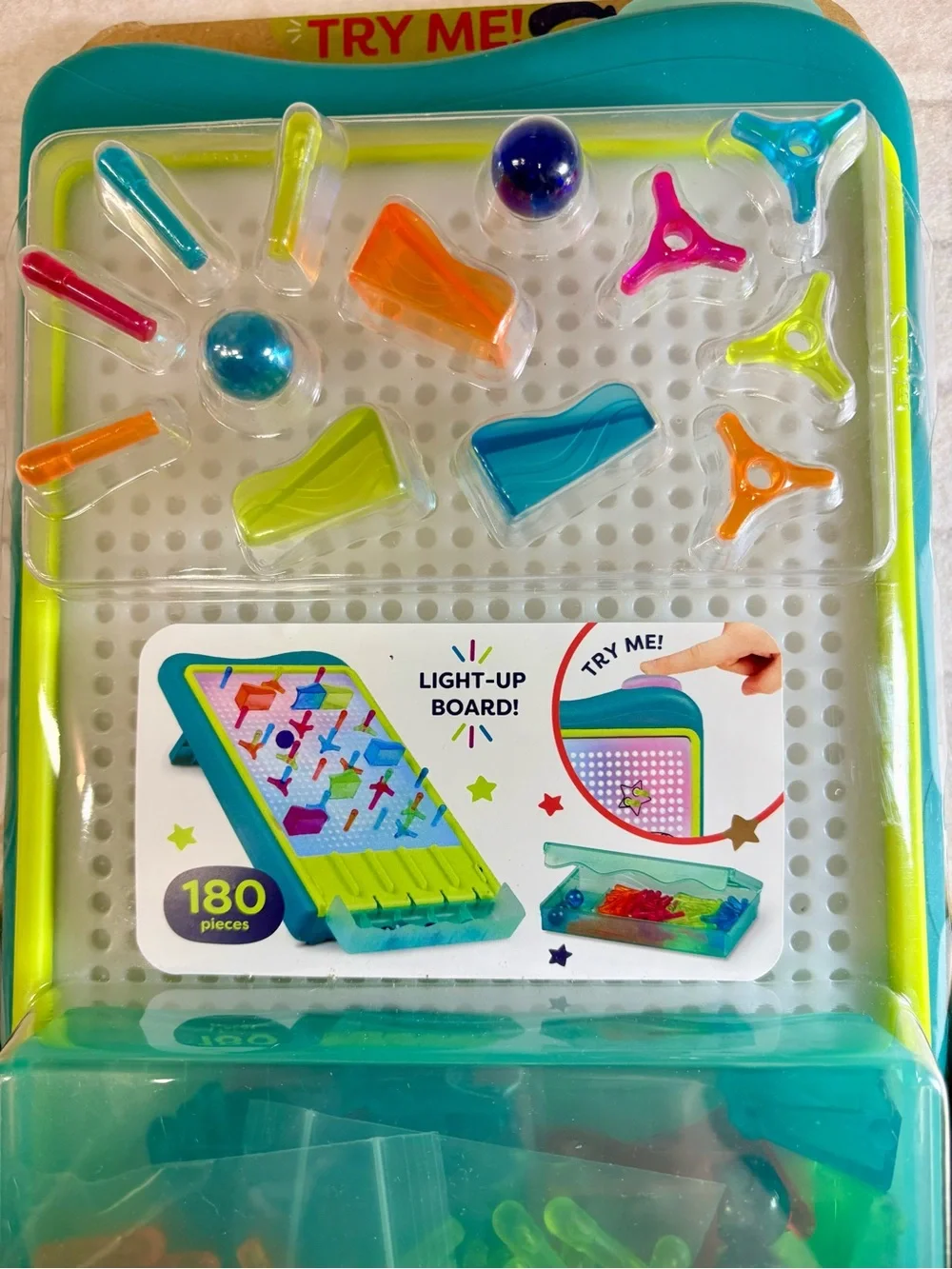 Light-Up Marble Drop Pegboard Toy - Teal Frame with Multicolor Pegs